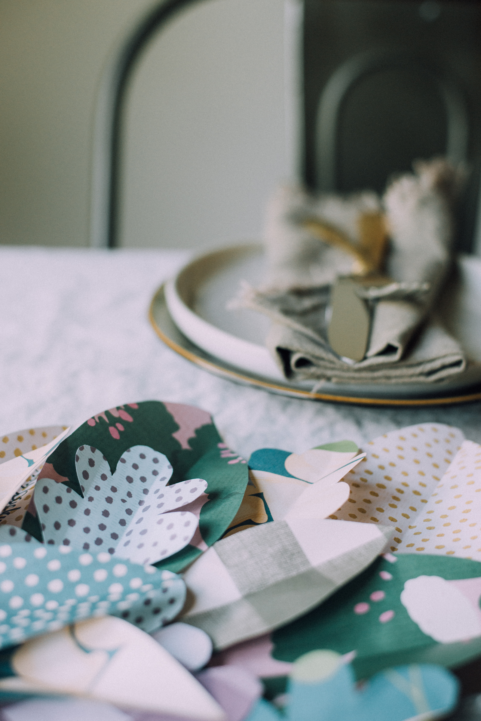 DIY Paper Leaf Thanksgiving Table runner on linen tablecloth